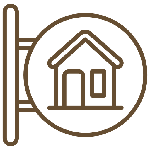 A simple line drawing of a sign with a house icon. The sign is round and mounted on a vertical pole on the left. The house has a triangular roof, a doorway, and a small rectangular window. The lines are dark brown on a transparent background.